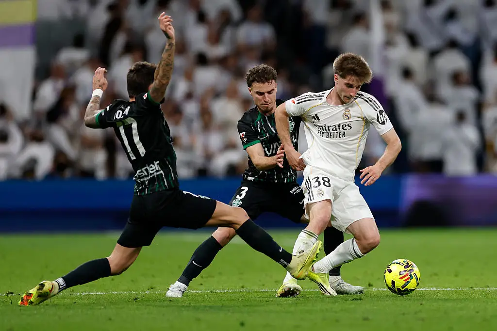 César Palacios player of Real Madrid in action during the LaLiga EA Sports match between Real Madrid CF and Elche CF at Estadio Santiago Bernabeu on March 14, 2026 in Madrid, Spain