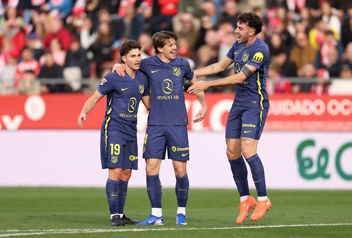 Conor Gallagher celebrates with teammates during Atletico Madrid's 3-0 win over Girona