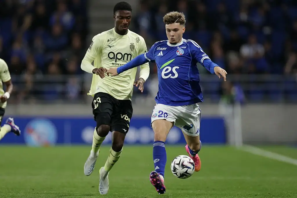 Strasbourg's French midfielder #29 Samir El Mourabet (R) fights for the ball with Monaco's French midfielder #23 Aladji Bamba during the French L1 football match between RC Strasbourg Alsace and AS Monaco at the Stade de la Meinau in Strasbourg, eastern France, on May 17, 2026