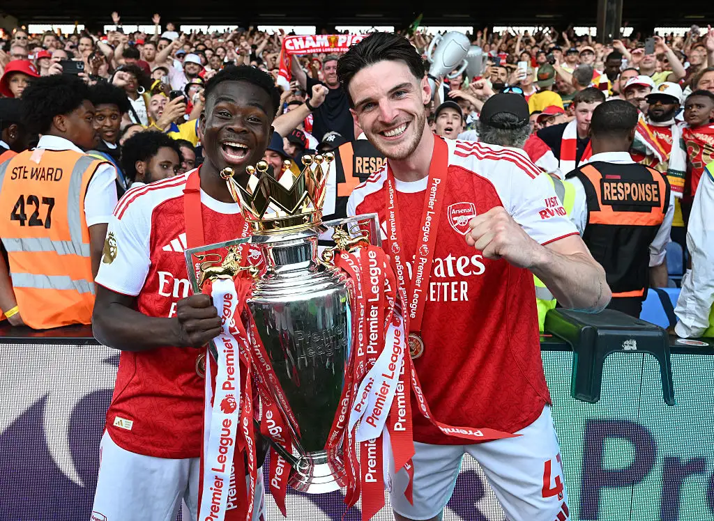 Arsenal's Bukayo Saka and Declan Rice celebrate after the Premier League match between Crystal Palace and Arsenal at Selhurst Park on May 24, 2026 in London, England