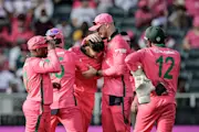 South Africa celebrate the wicket of Alex Carey