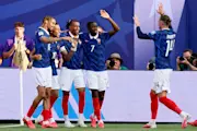 Mbappe, Olise, Dembele, Barcola and Rabiot celebrate a goal for France at the 2026 World Cup.