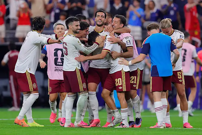 Spain's players celebrate their win over France in the 2026 World Cup semi finals.