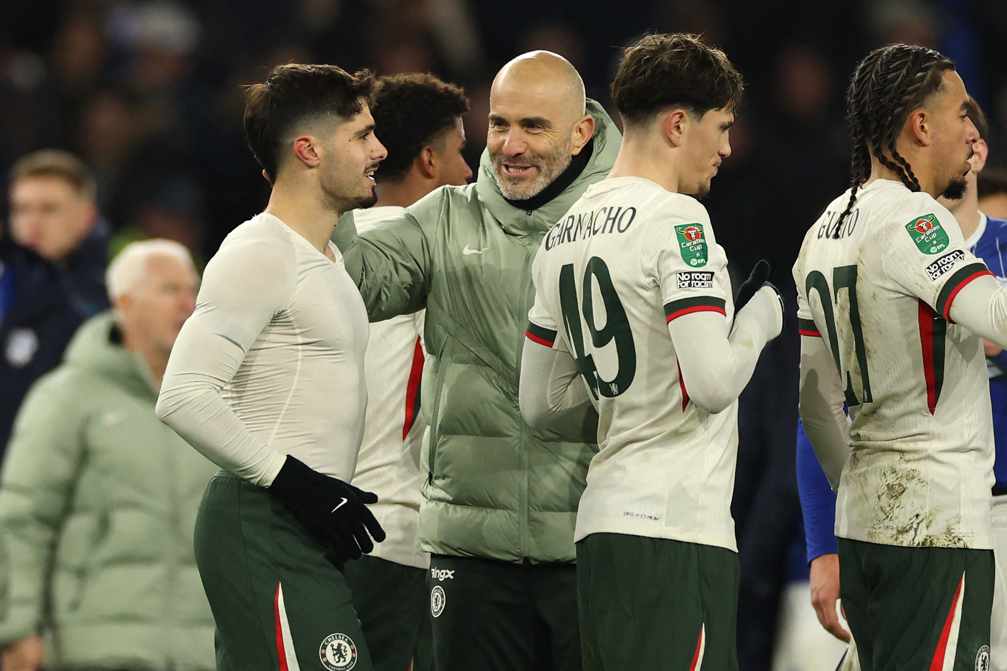 Enzo Maresca congratulates his players after Chelsea's 3-1 win over Cardiff