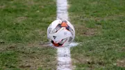 Footballer charged with attempted murder after kicking ref in head