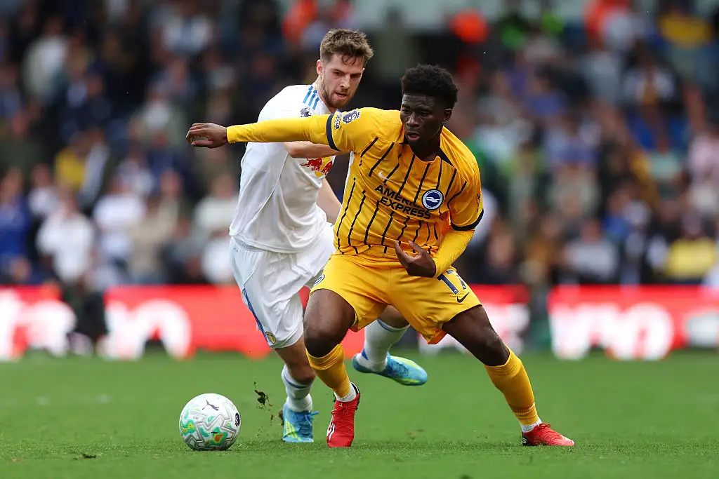 Carlos Baleba of Brighton & Hove Albion is put under pressure by Anton Stach of Leeds United during the Premier League match between Leeds United and Brighton & Hove Albion at Elland Road on May 17, 2026 in Leeds, England