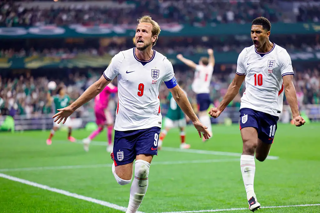 England's forward #09 Harry Kane celebrates scoring his team's third goal with England's midfielder #10 Jude Bellingham during the 2026 World Cup round of 16 football match between Mexico and England at the Mexico City Stadium in Mexico City on July 5, 2026