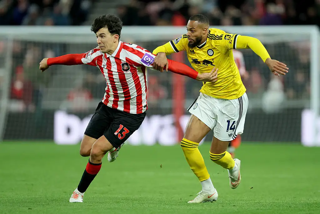 Luke O'Nien of Sunderland and Lukas Nmecha of Leeds United challenge during the Premier League 2026/27 match between Sunderland and Leeds United at Stadium of Light on October 25, 2026 in Sunderland, England