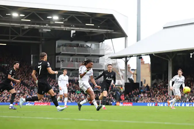 Alex Iwobi of Fulham scores his team's second goal during the Premier League match between Fulham and Tottenham Hotspur at Craven Cottage