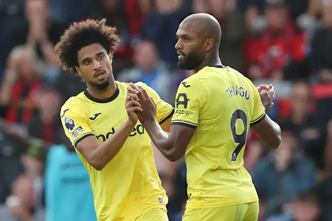 Kevin Schade (left) earned Brentford a point at Bournemouth by scoring twice for the Bees in a 2-2 draw