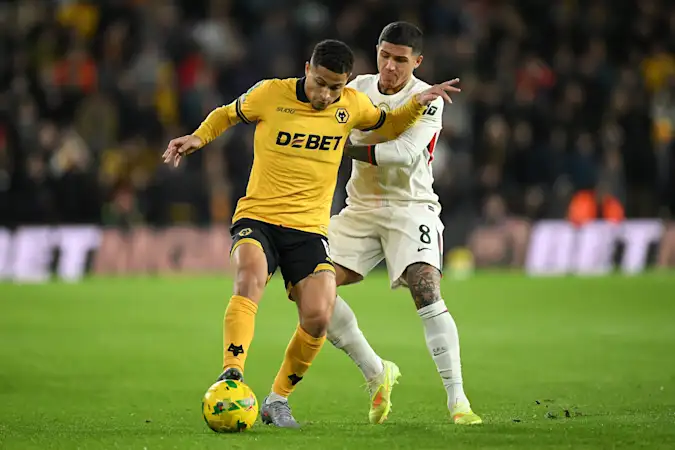 Enzo Fernandez pressures Joao Gomes during Chelsea's EFL Cup win over Wolves
