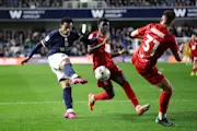 Femi Azeez of Millwall scores his team's first goal during the Sky Bet Championship match between Millwall and Birmingham City at The Den 