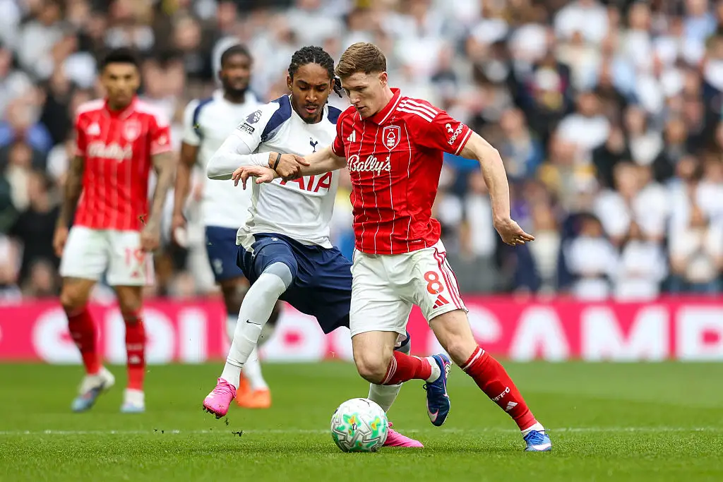 Djed Spence of Tottenham Hotspur and Elliot Anderson during the Premier League match between Tottenham Hotspur and Nottingham Forest at Tottenham Hotspur Stadium on March 22, 2026 in London, England