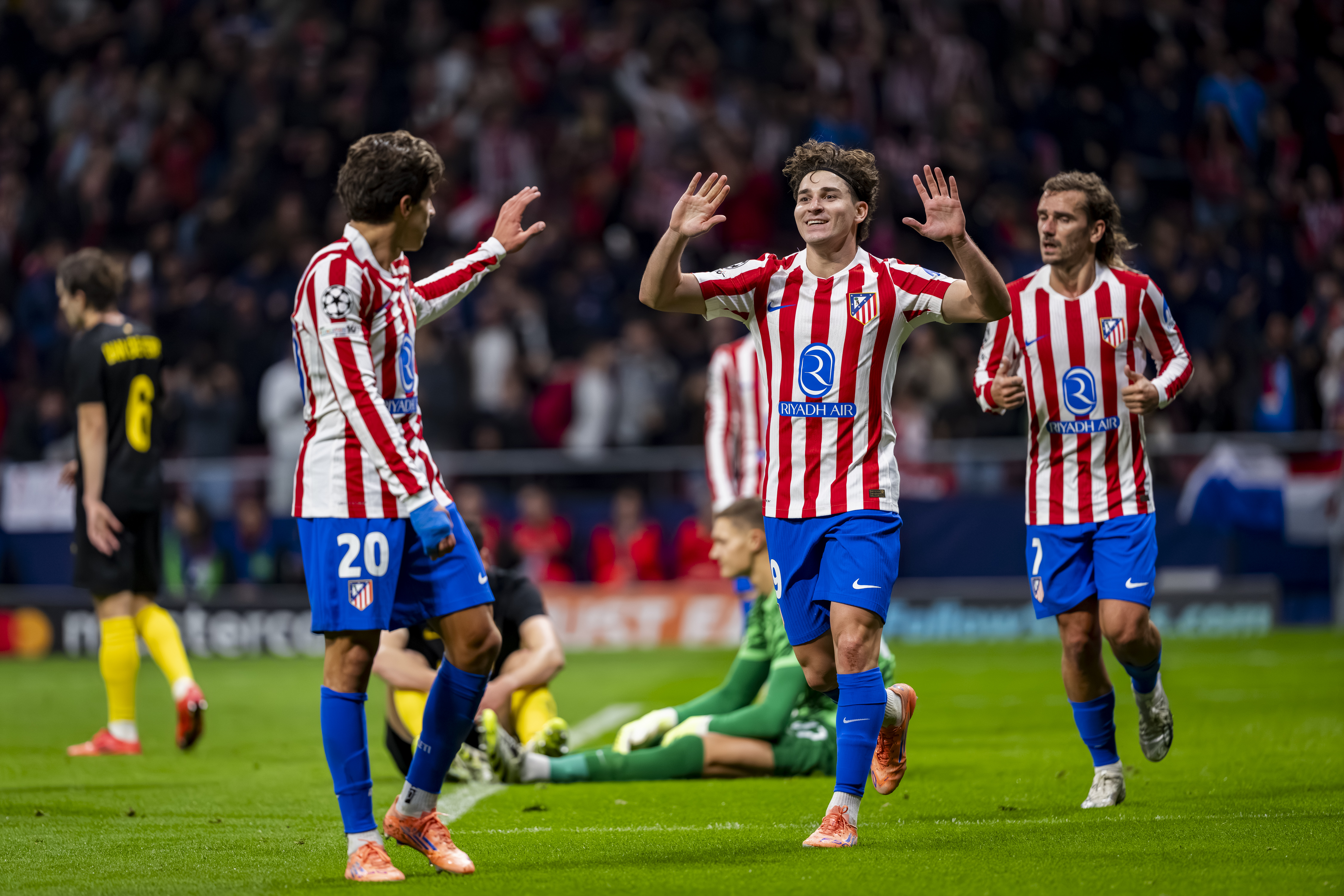 Julian Alvarez celebrates with Giuliano Simeone in Atletico Madrid's 3-1 win over Union St.Gilloise