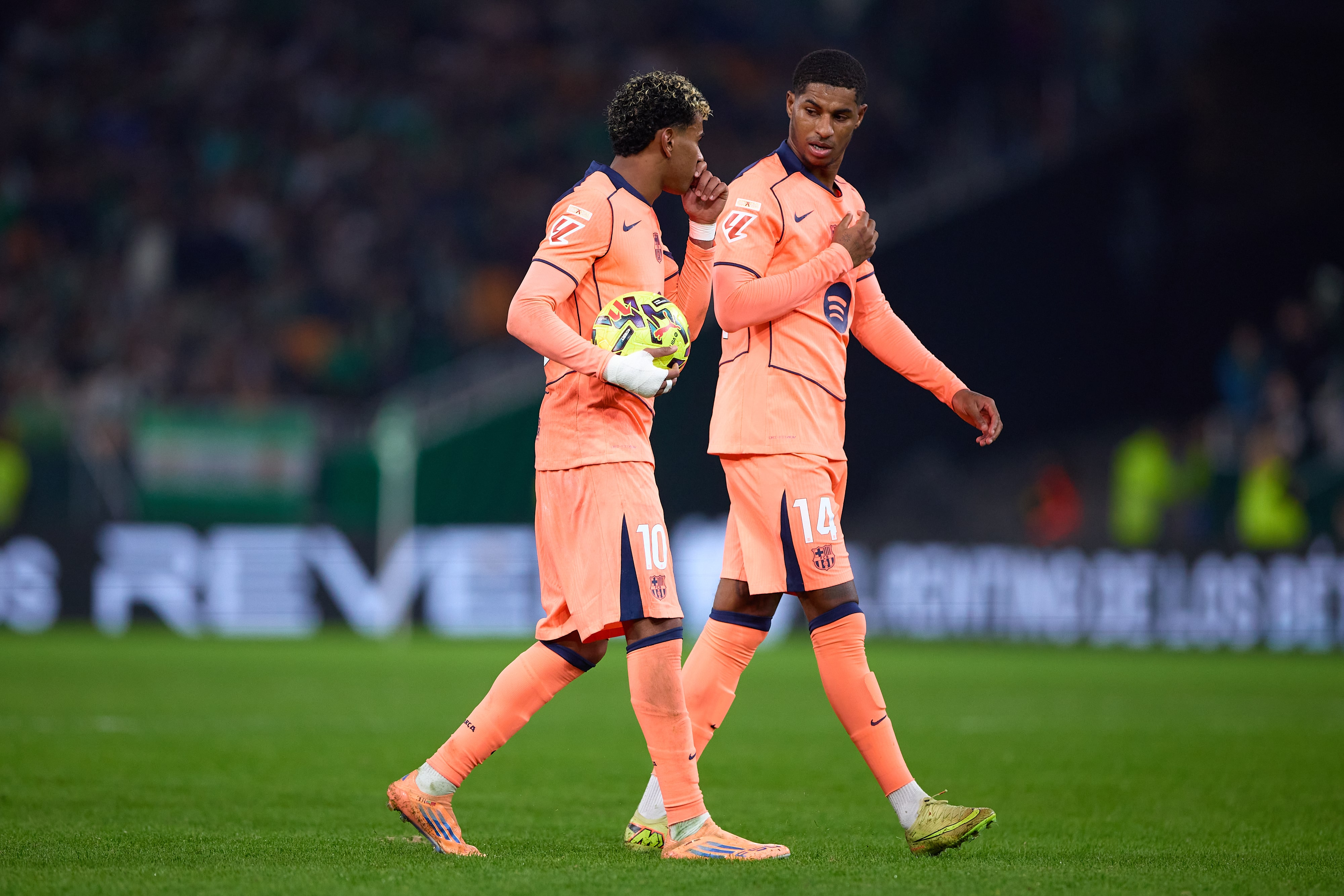 Lamine Yamal and Marcus Rashford in conversation following Barcelona's 5-3 win at Real Betis on Saturday