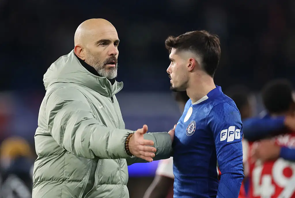 Enzo Maresca manager / head coach of Chelsea with Pedro Neto of Chelsea during the Premier League match between Chelsea and Arsenal at Stamford Bridge on November 30, 2025 in London, England