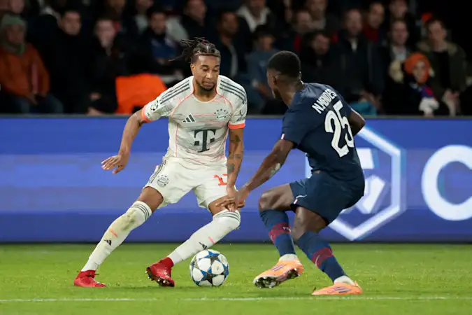 Bayern Munich forward Michael Olise in action against PSG