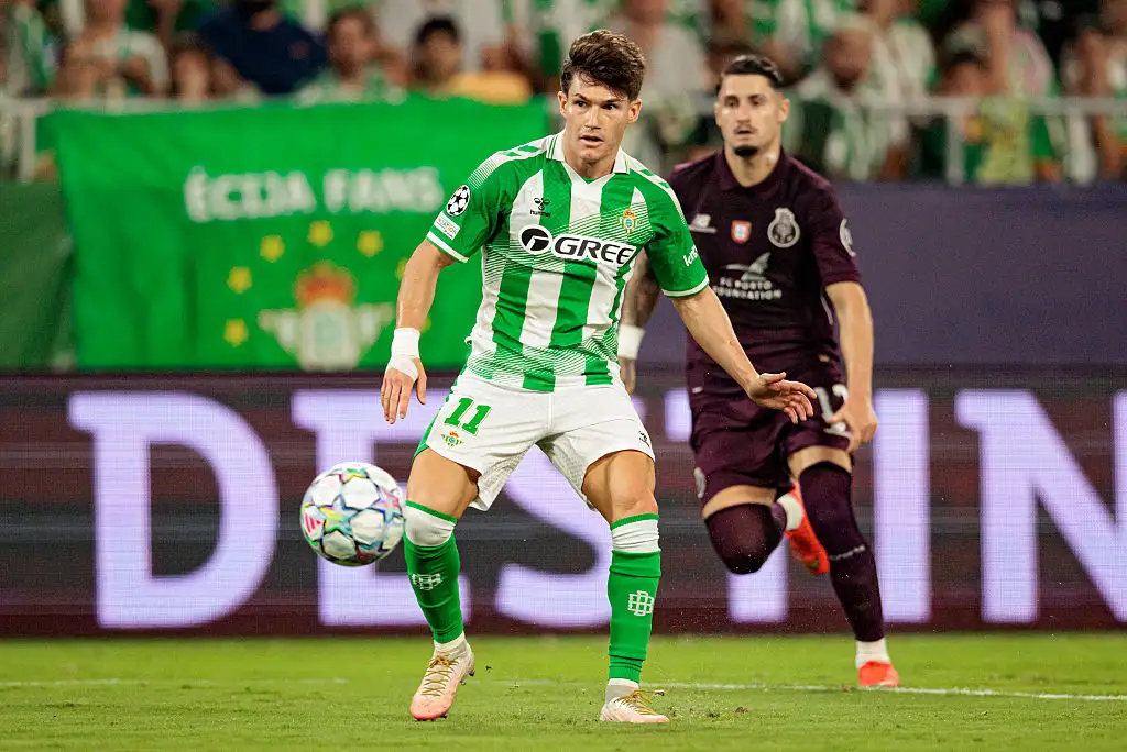 Fran Garcia of Real Betis Balompie passes the ball during the UEFA Champions League 2026/27 League Phase MD2 match between Real Betis Balompie and FC Porto at Estadio de La Cartuja on October 14, 2026 in Seville, Spain