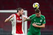 Wout Weghorst contests for the ball in Ajax vs Gronginen in the Eredivisie.