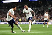 Savio and Mateus Fernandes of Tottenham Hotspur celebrate a goal against Charlton.