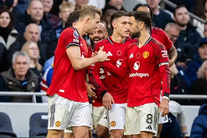Matthijs de Ligt and Bruno Fernandes celebrate Man Utd's equaliser at Tottenham