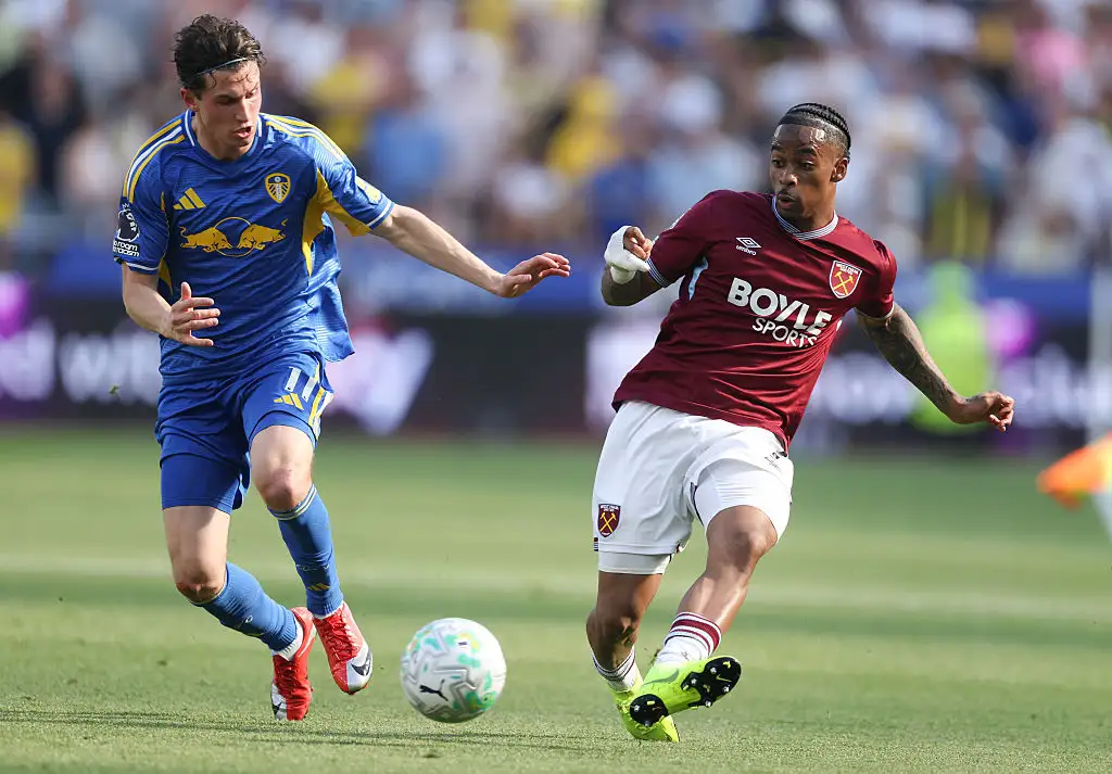 Brenden Aaronson of Leeds United and Crysencio Summerville of West Ham United during the Premier League match between West Ham United and Leeds United at London Stadium on May 24, 2026 in London, England