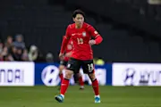 PSG's Lee Kaing-In in action for South Korea in an international friendly fixture against Ivory Coast.