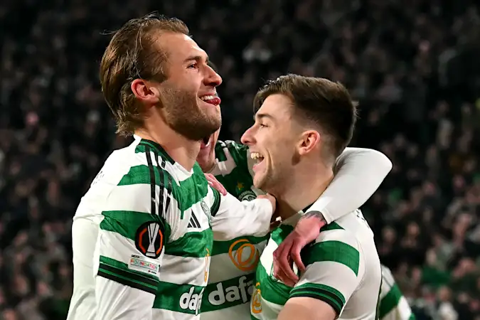 Celtic's Swedish midfielder #08 Benjamin Nygren (L) celebrates scoring the team's first goal during the UEFA Europa League league-stage football match between Celtic and FC Utrecht at Celtic Park in Glasgow 