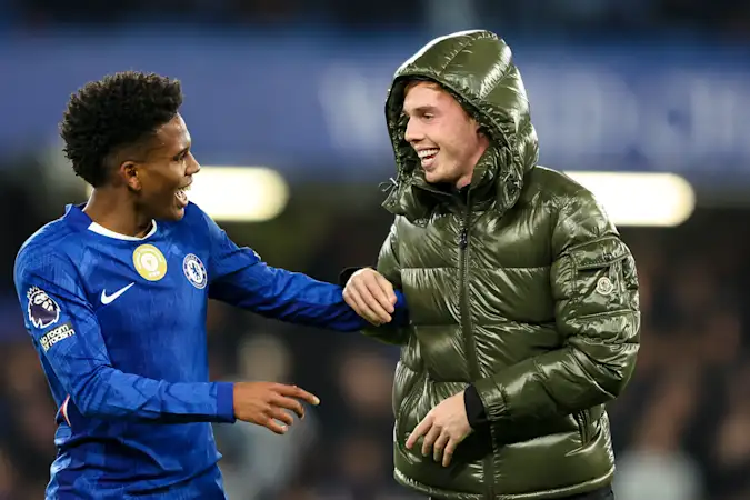 Estevao and Cole Palmer celebrate Chelsea's late win over Liverpool