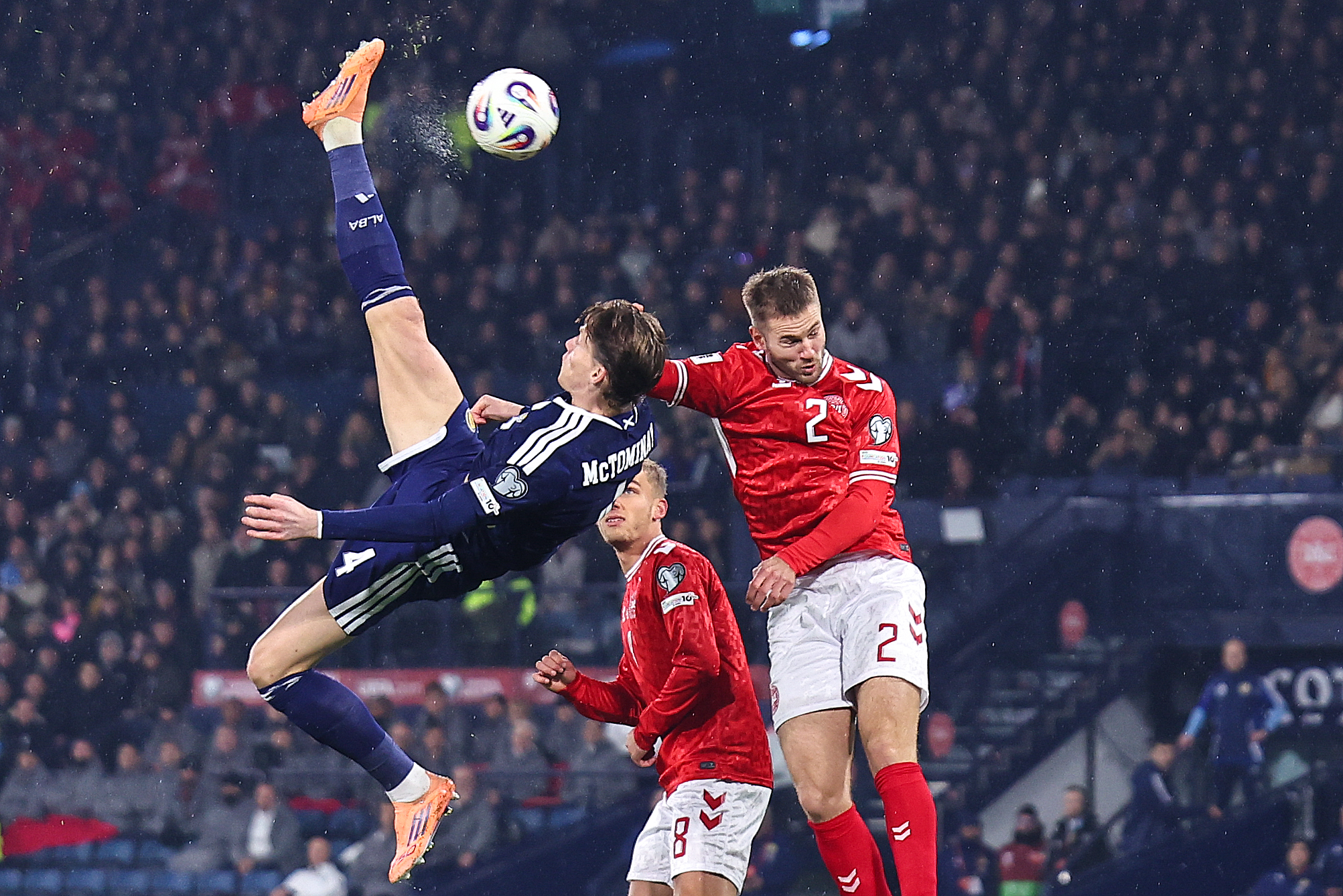 Scotland midfielder scoring a bicycle kick against Denmark
