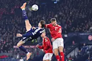 Scotland midfielder scoring a bicycle kick against Denmark