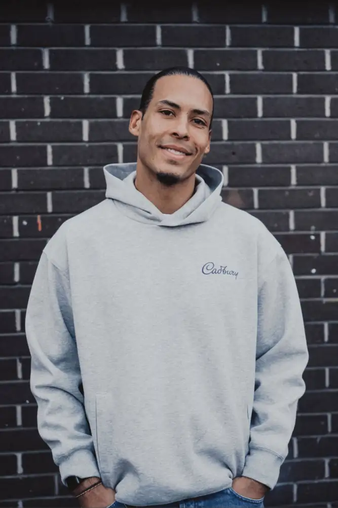 You could get to meet Liverpool captain Virgil van Dijk by taking part in the Win For Your Squad promotion. Credit: Cadbury.