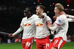 Yan Diomande, Christoph Baumgartner and Conrad Harder celebrate for RB Leipzig