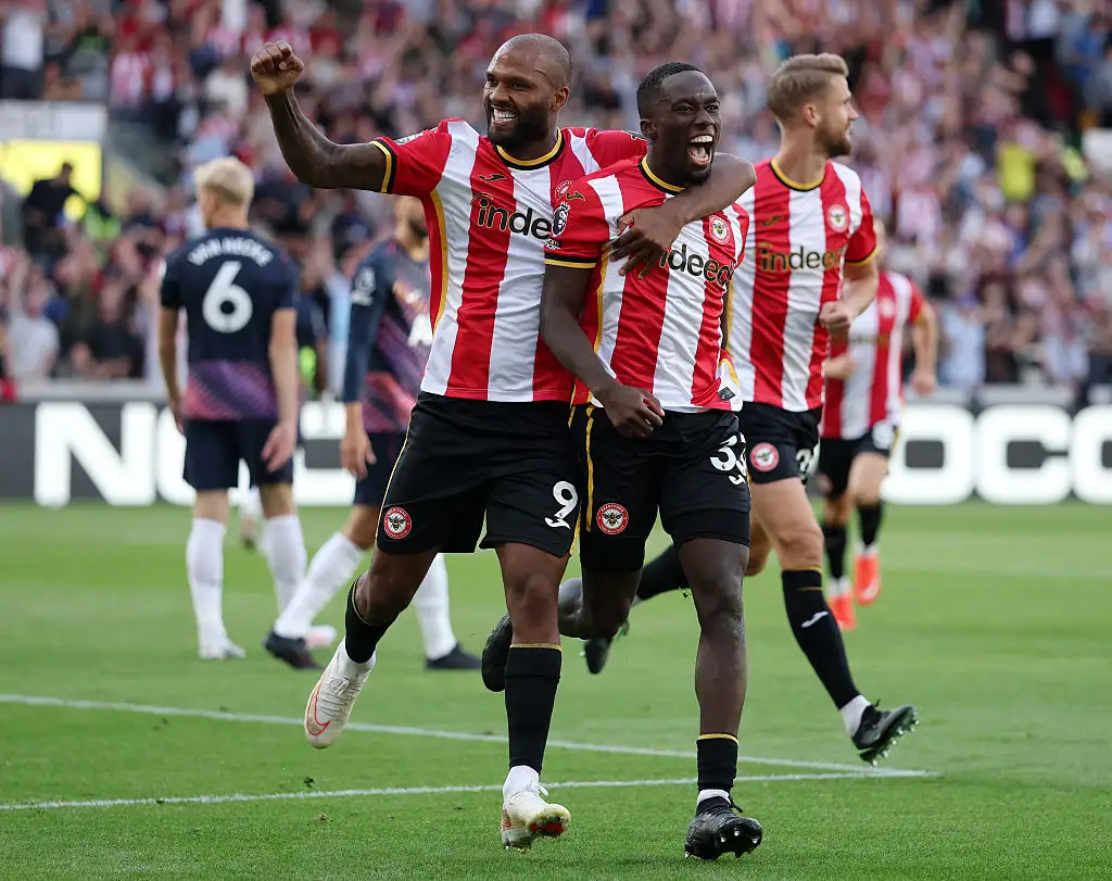 Michael Kayode of Brentford celebrates scoring his team’s third goal with teammate Igor Thiago during the Premier League 2026/27 match between Brentford and Tottenham Hotspur at Gtech Community Stadium on August 22, 2026 in Brentford, England