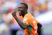 Nicolas Pepe celebrates his first goal for Ivory Coast against Curacao