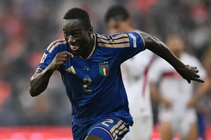 Michael Kayode celebrates scoring a first-ever goal for Italy on his national team debut