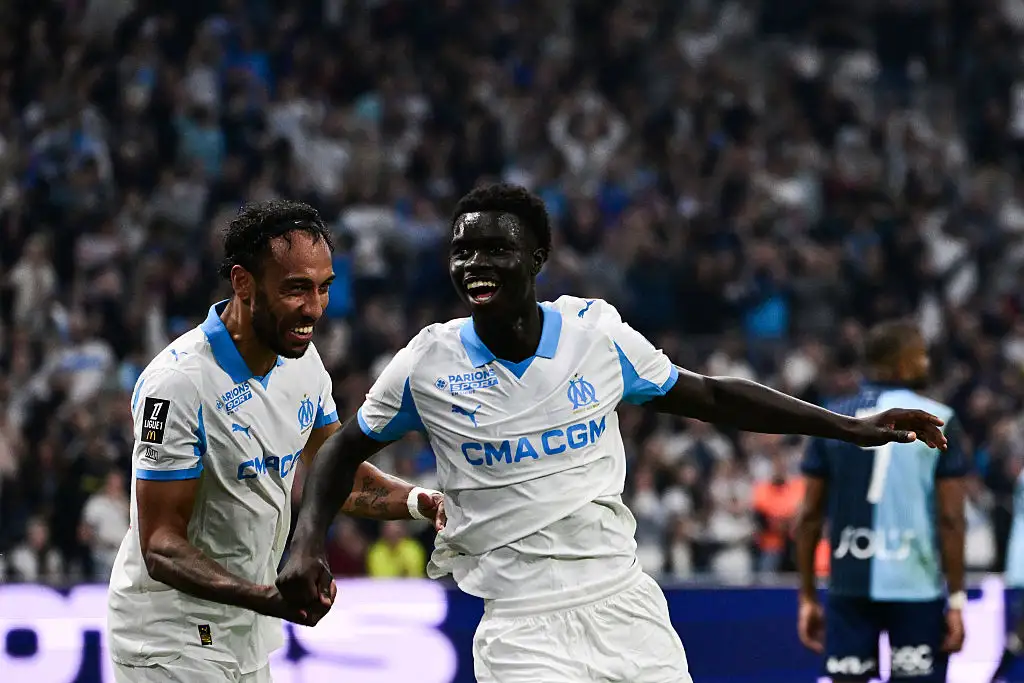 Marseille's French forward #34 Robinio Vaz celebrates with Marseille's Gabonese forward #97 Pierre-Emerick Aubameyang after scoring his team fifth goal during the French L1 football match between Olympique de Marseille (OM) and Le Havre AC at the Stade Velodrome in Marseille, southern France, on October 18, 2025