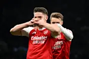 Viktor Gyoekeres of Arsenal celebrates with teammate Martin Odegaard after scoring his team's fourth goal during the Premier League match between Tottenham Hotspur and Arsenal at Tottenham Hotspur Stadium. (Photo by Mike Hewitt/Getty Images)