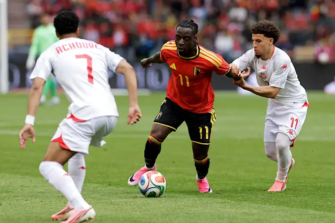 Jeremy Doku in action for Belgium in an international friendly fixture against Tunisia.