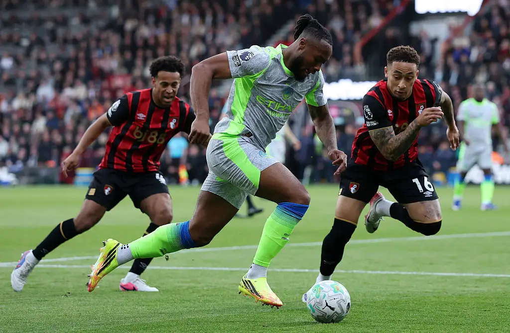 Antoine Semenyo of Manchester City runs with the ball while under pressure from Marcus Tavernier of AFC Bournemouth during the Premier League match between Bournemouth and Manchester City at Vitality Stadium on May 19, 2026 in Bournemouth, England
