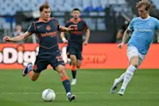 Nicolo Barella controls the ball during the Italian Serie A football match between Lazio and Inter at the Olympic stadium