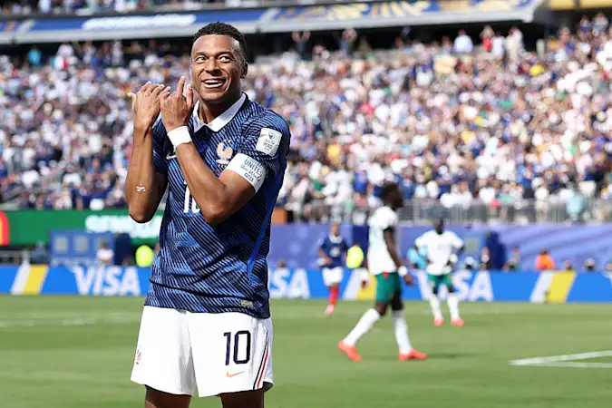 Kylian Mbappe celebrates his goal against Senegal
