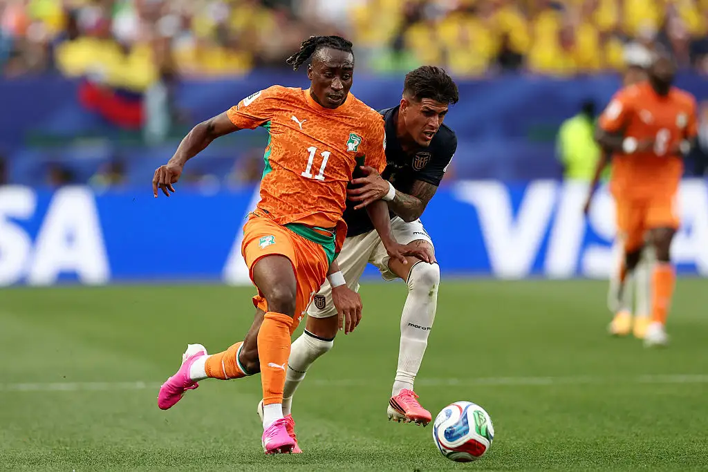 Ivory Coast's forward #11 Yan Diomande runs with the ball past Ecuador's defender #03 Piero Hincapie during the 2026 World Cup Group E football match between Ivory Coast and Ecuador at the Philadelphia Stadium in Philadelphia on June 14, 2026