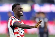 Folarin Balogun celebrates after scoring his first of two goals for the USA against Paraguay