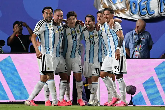 Argentina start their title defence in style
