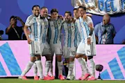 Argentina start their title defence in style