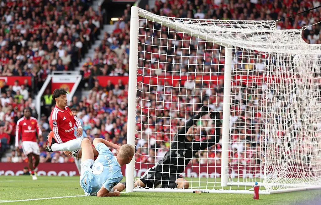 Erling Haaland of Manchester City scores his team’s first goal during the Premier League 2026/27 match between Manchester United and Manchester City at Old Trafford on September 13, 2026 in Manchester, England