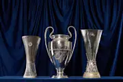 The Conference League, Champions League and Europa League trophies