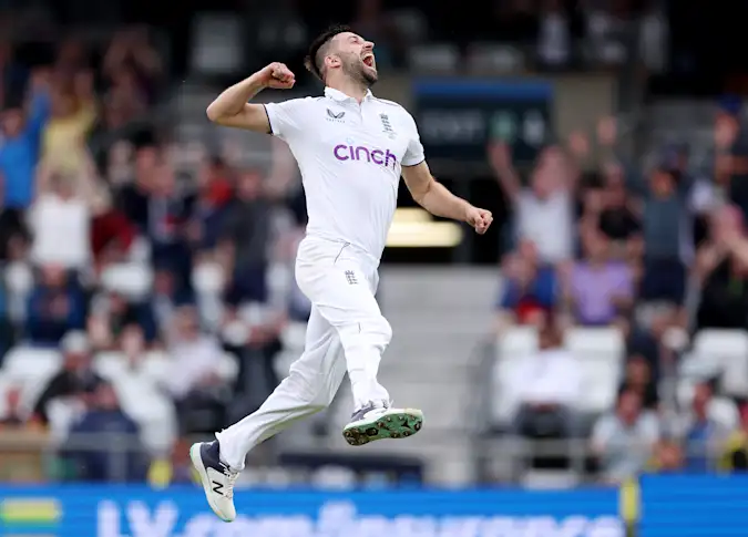 Mark Wood celebrates the wicket of Australian skipper Pat Cummins in the 2023 Ashes