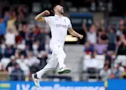 Mark Wood celebrates the wicket of Australian skipper Pat Cummins in the 2023 Ashes